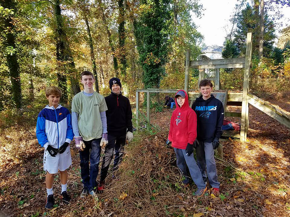 Removing English Ivy from the playground at High Point Episcopal Community Church