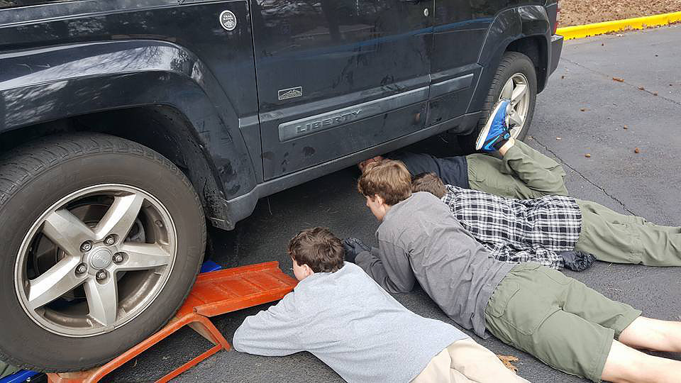 Learning how to take care of a car at Automotive Maintenance merit badge